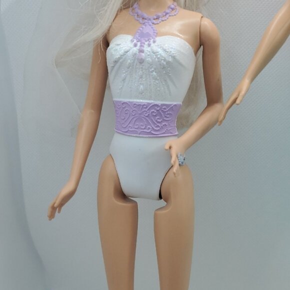 Mattel Dolls with Blonde Hair and Colorful Outfits - Picture 6 of 14